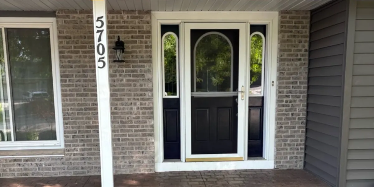 Front door and sidelights painted black after
